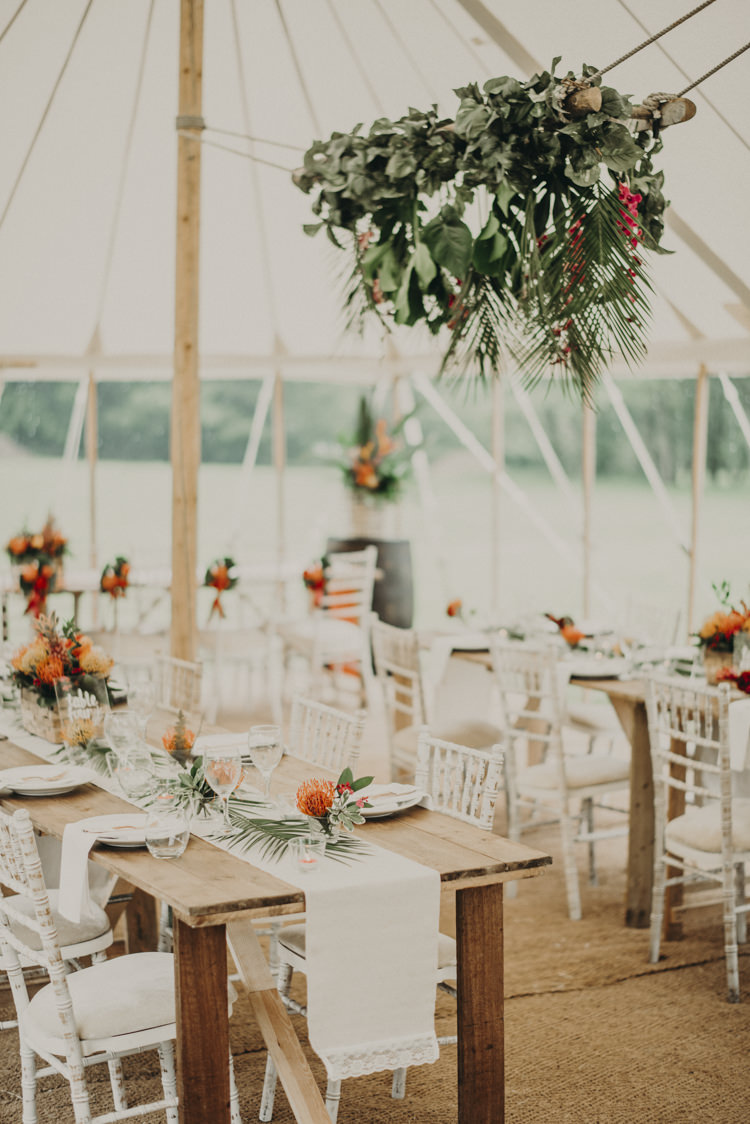 Hanging Flowers Palm Leaf Marquee Decor Vibrant Tropical Wedding Ideas http://foto-memories.co.uk/