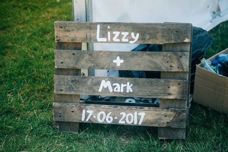 Wooden Pallet Sign Eco Friendly Floral Filled Wedding http://kellyjphotography.co.uk/