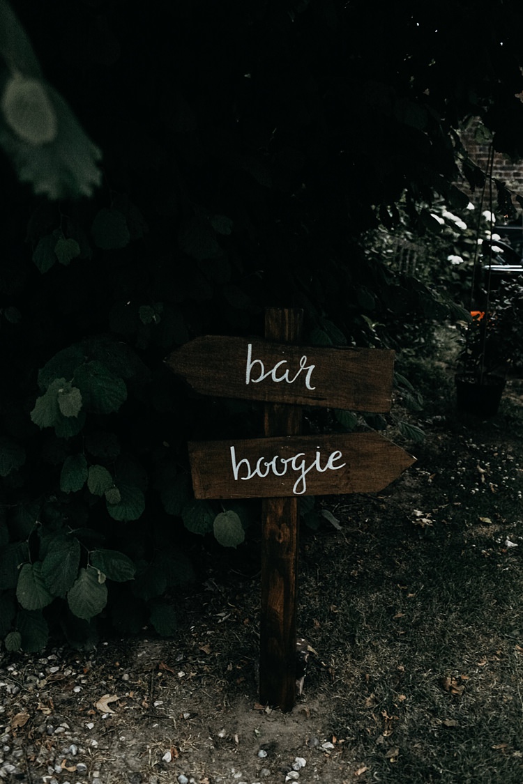 Wooden Painted Sign Post Rustic Greenery Copper Chateau Wedding in France http://hindmari.com/