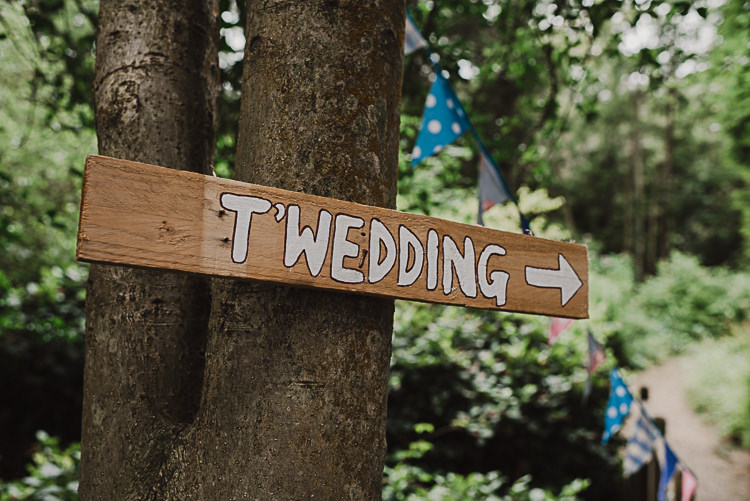 Wooden Rustic Painted Sign Post Stylish Woodland Tipi Wedding Flower Arch https://willpatrickweddings.com/