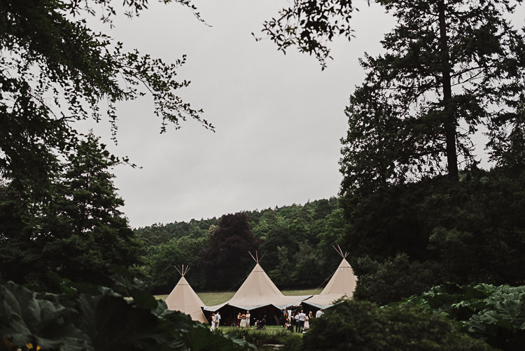 Stylish Woodland Tipi Wedding Flower Arch https://willpatrickweddings.com/