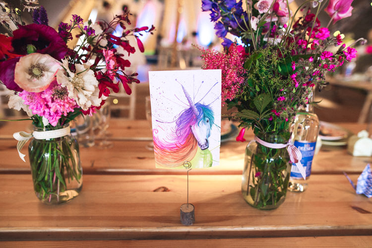 Unicorn Painting Table Name Flowers Decor Outdoorsy Welcoming Colourful Tipi Wedding http://www.sallytphoto.com/