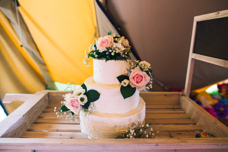 Buttercream Cake Flowers Outdoorsy Welcoming Colourful Tipi Wedding http://www.sallytphoto.com/