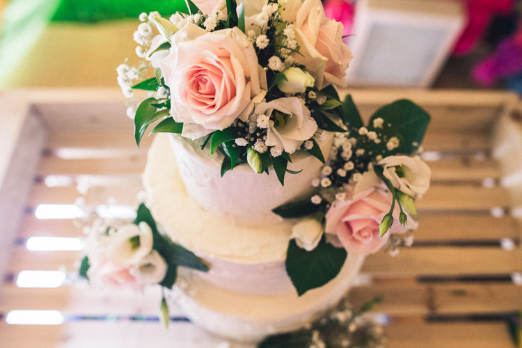 Buttercream Cake Flowers Outdoorsy Welcoming Colourful Tipi Wedding http://www.sallytphoto.com/