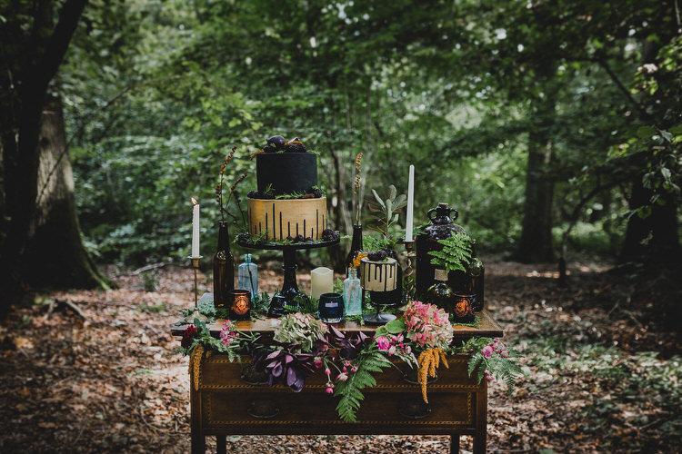 Cake Table Black Gold Treats Candles Flowers Atmospheric Woodland Wedding Ideas http://www.kategrayphotography.com/
