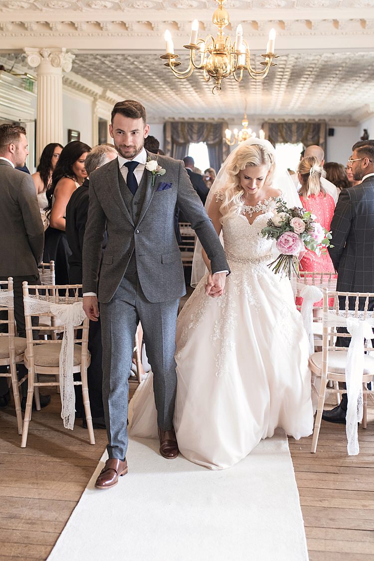 Bride Bridal Dress Gown Ronald Joyce Strapless Sweetheart Crystal Swarovski Shoulder Necklace Veil Blush Bouquet Peonies Roses Eucalyptus Reiss Groom Wool Grey Three Piece Waistcoat Pocket Square Classic Romantic Pretty Wedding https://kerryannduffy.com/