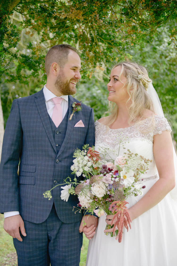 Bride Bridal Justin Alexander Dress Gown A Line Slaters Menswear Groom Grey Checked Three Piece Waistcoat Suit Pocket Square Watch Pink Tie Bouquet Meadow Wild Flower Florals Fun Pastel Country Marquee Wedding http://kimberleywaterson.com/