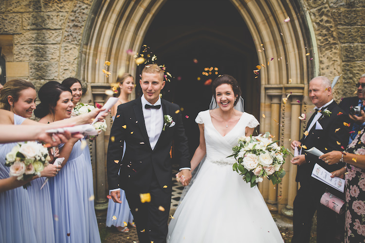Bride Bridal Ronald Joyce A Line Dress Gown Tuxedo Bow Tie Groom Confetti Shot Black Tie Glamour Country Estate Wedding https://www.chrisblackledgephotography.co.uk/
