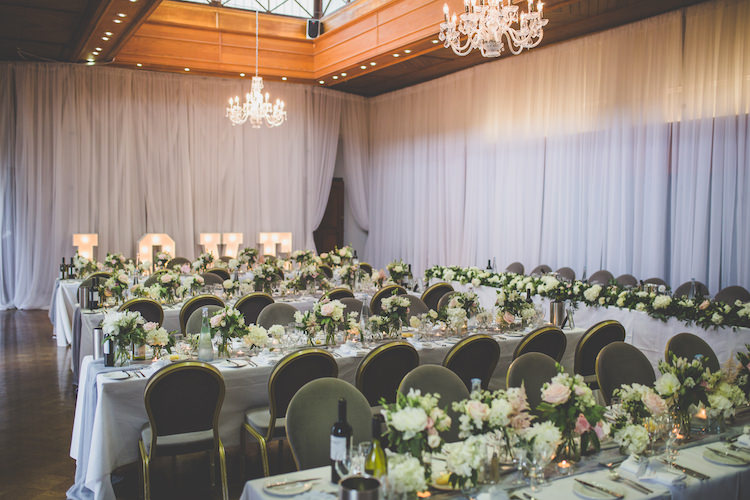 Draping Chandelier White Pink Blush Pale Floral Flowers Grey Voile Table Setting Black Tie Glamour Country Estate Wedding https://www.chrisblackledgephotography.co.uk/