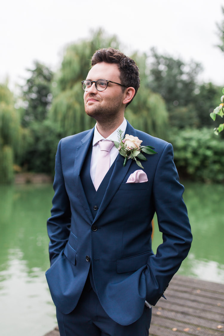 Groom Suit Navy Pink Tie Glasses Simple Natural Honest Marquee Wedding https://www.gemmagiorgio.com/