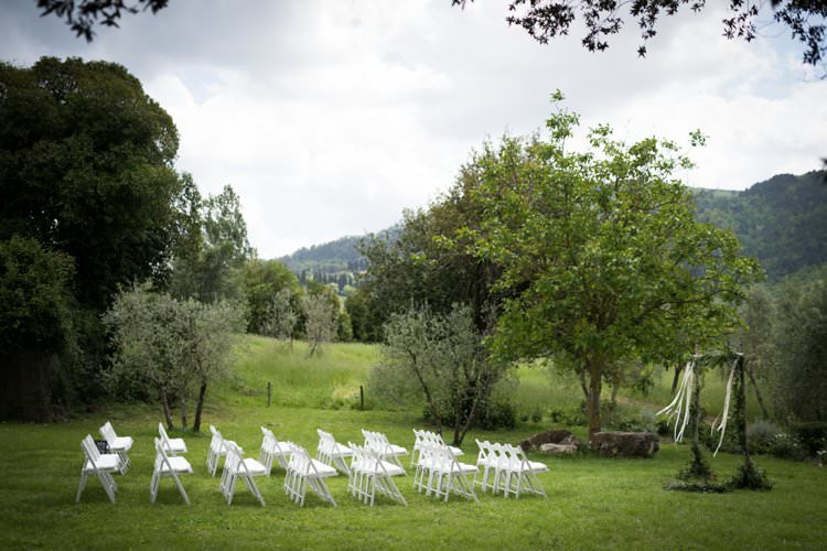 Ceremony White Chairs Sunflower Arch Ribbons Yellow Navy Outdoor Tuscany Wedding http://www.natalymontanari.com/
