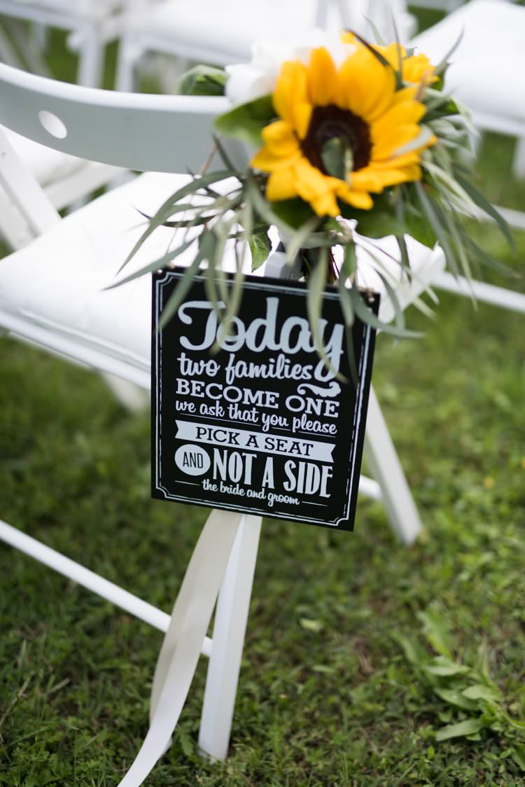 Sunflower Aisle Decor Signage Pick a Seat Not a Side Yellow Navy Outdoor Tuscany Wedding http://www.natalymontanari.com/