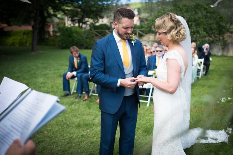 Ceremony Ring Exchange Bride Groom Yellow Navy Outdoor Tuscany Wedding http://www.natalymontanari.com/