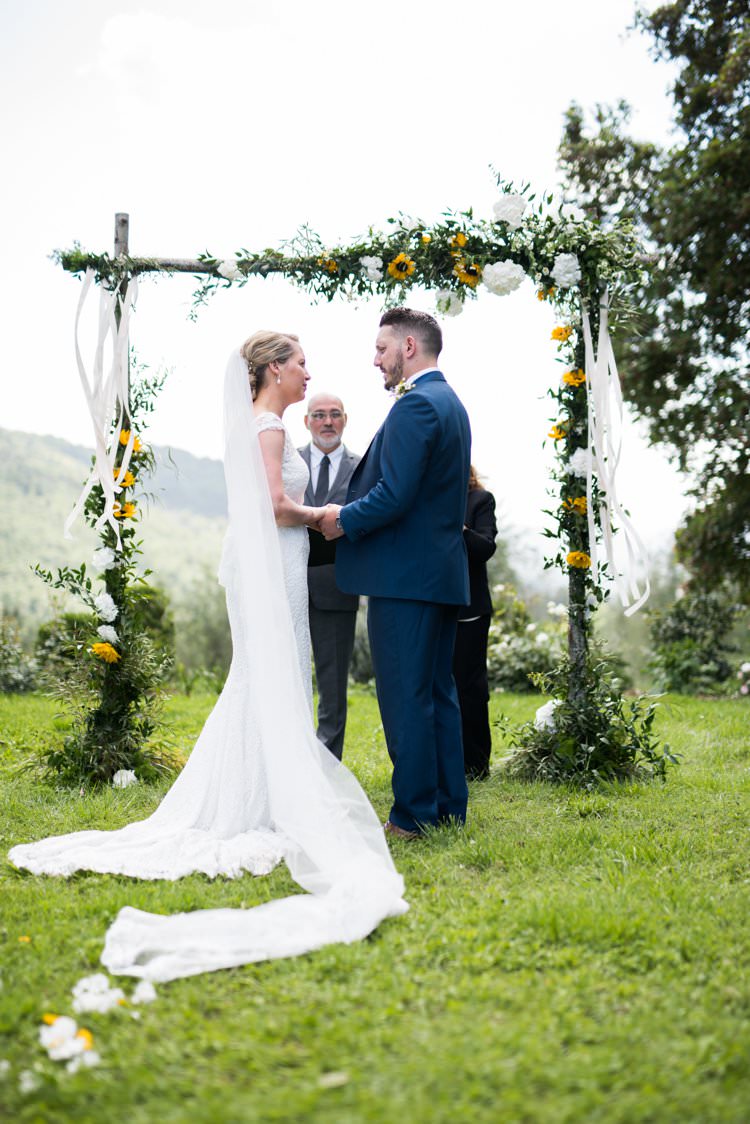 Ceremony Sunflower Arch Bride Long Veil Yellow Navy Outdoor Tuscany Wedding http://www.natalymontanari.com/