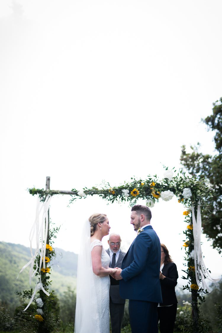 Bride Groom Ceremony Arch Sunflowers Yellow Navy Outdoor Tuscany Wedding http://www.natalymontanari.com/