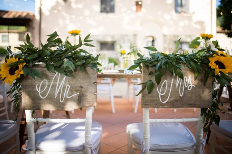 Mr Mrs Chair Backs Sunflowers Yellow Navy Outdoor Tuscany Wedding http://www.natalymontanari.com/