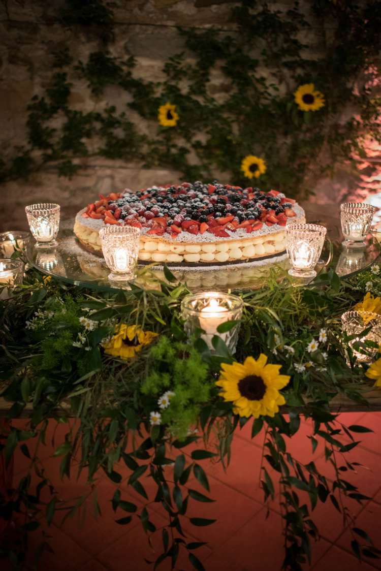 Italian Cake Cream Berries Sunflowers Candles Yellow Navy Outdoor Tuscany Wedding http://www.natalymontanari.com/