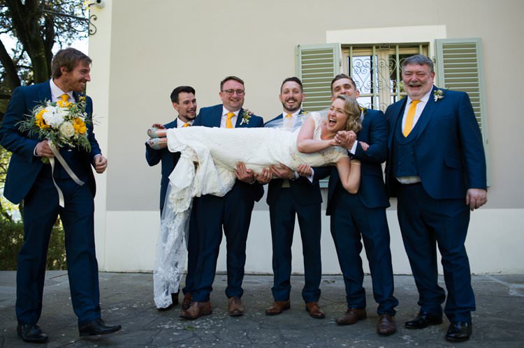 Bride Lift Groomsmen Yellow Navy Outdoor Tuscany Wedding http://www.natalymontanari.com/