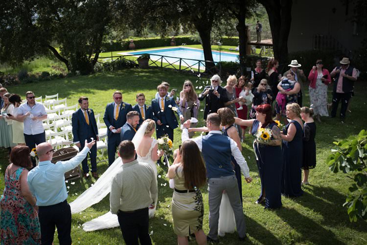 Recessional Confetti Toss Yellow Navy Outdoor Tuscany Wedding http://www.natalymontanari.com/