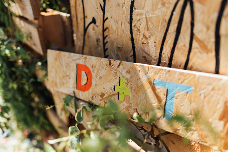 Wooden Painted Sign Alternative Colourful Outdoor Humanist Village Hall Wedding http://www.chebirchhayesphotography.com/