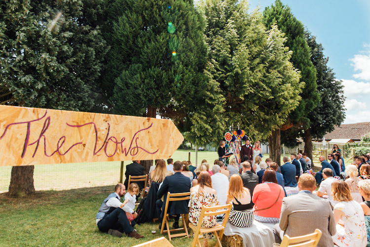 Wooden Sign Post Alternative Colourful Outdoor Humanist Village Hall Wedding http://www.chebirchhayesphotography.com/