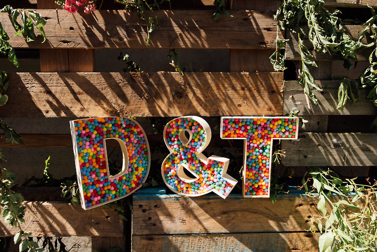 Pom Pom Letters Initials Alternative Colourful Outdoor Humanist Village Hall Wedding http://www.chebirchhayesphotography.com/