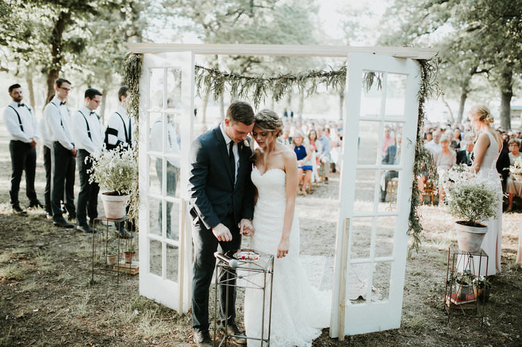 Outdoor Rustic Boho Forest Ceremony Backdrop Rug Vintage Door Window Greenery | Organic Earthy Fun Wedding Oklahoma http://zaynewilliams.com/