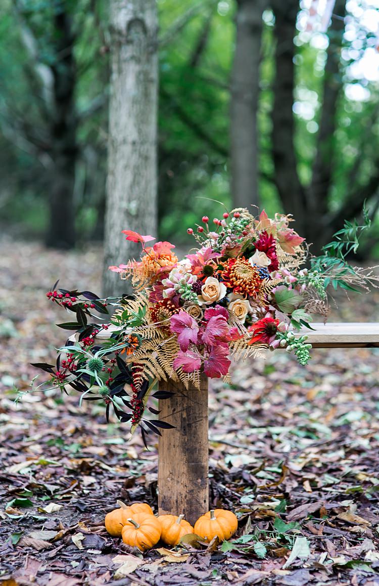 Bouquet Flowers Bride Bridal Dahlia Berrries Ferns Leaves Leaf Orange Red Ribbons 1970s Gypsy Bohemian Autumn Woodland Wedding Ideas http://carolineopacicphotography.com/