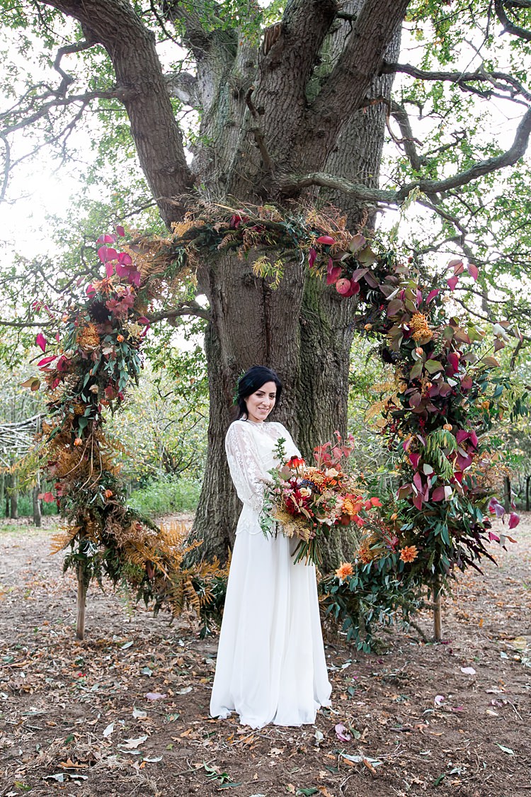 Wreath Hoop Large Backdrop Flowers Floral Orange Red 1970s Gypsy Bohemian Autumn Woodland Wedding Ideas http://carolineopacicphotography.com/