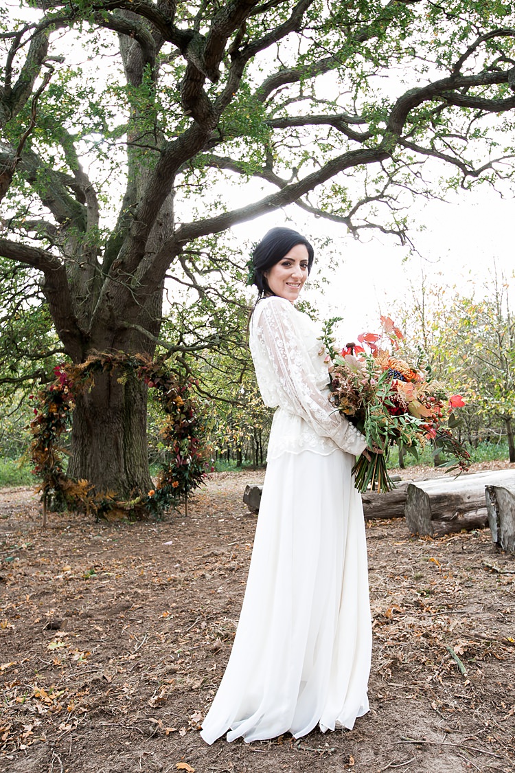 Wreath Hoop Large Backdrop Flowers Floral Orange Red 1970s Gypsy Bohemian Autumn Woodland Wedding Ideas http://carolineopacicphotography.com/