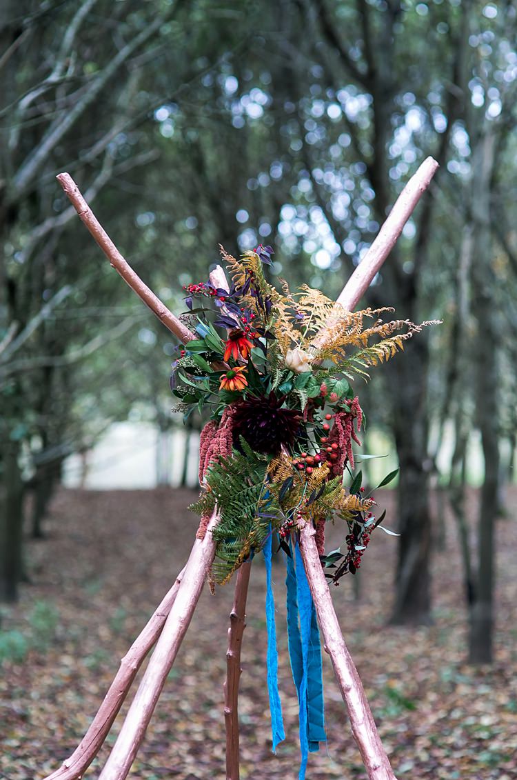 Flowers Backdrop Tipi Branch Decor Ceremony 1970s Gypsy Bohemian Autumn Woodland Wedding Ideas http://carolineopacicphotography.com/
