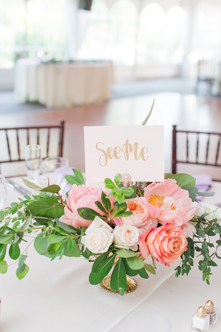 Table Names Books Nicholas Sparks Centrepiece Floral Bright Coral Garden Wedding New Jersey http://somethingbluenj.com/