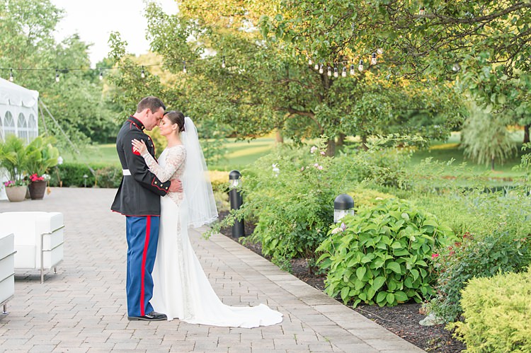 Groom Military Bride Lace Gown Sheer Long Sleeve Bright Coral Garden Wedding New Jersey http://somethingbluenj.com/