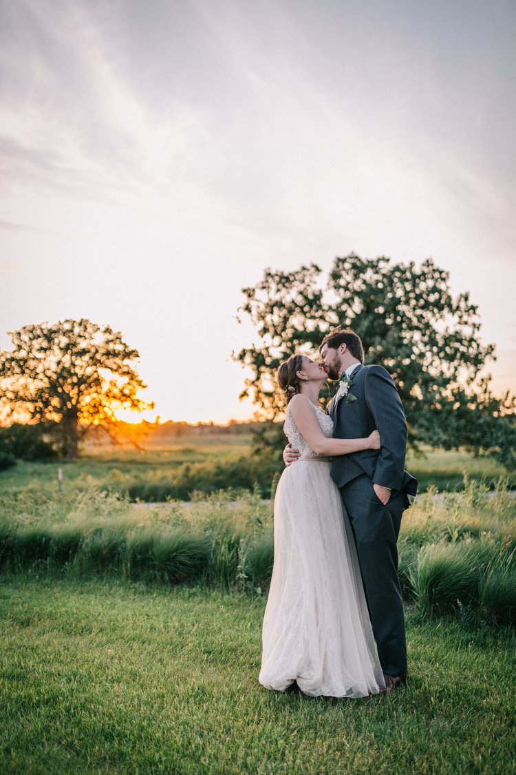Bride Groom Bow Tie Floaty Dress Gown Blush Lace Scoop Back Buttons Sunset Updo Outdoorsy Modern Wedding in Wisconsin http://www.mcnielphotography.com/