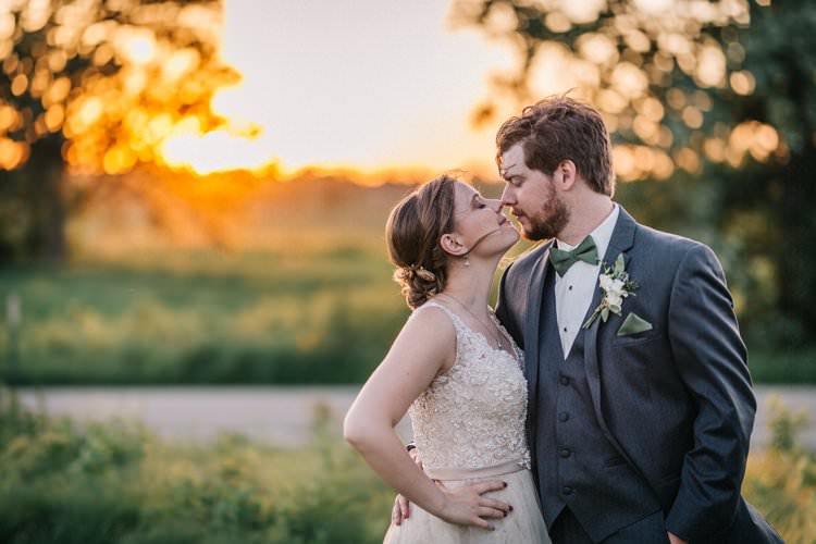 Bride Groom Bow Tie Floaty Dress Gown Blush Lace Scoop Back Buttons Sunset Updo Outdoorsy Modern Wedding in Wisconsin http://www.mcnielphotography.com/