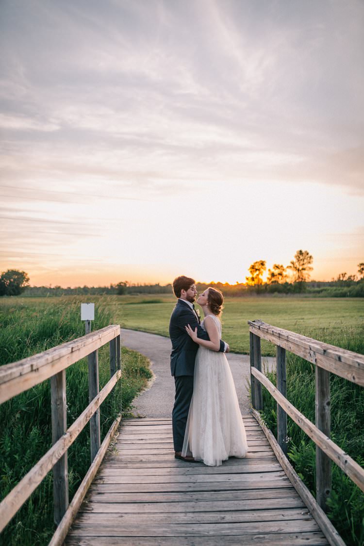 Bride Groom Bow Tie Floaty Dress Gown Blush Lace Scoop Back Buttons Sunset Updo Outdoorsy Modern Wedding in Wisconsin http://www.mcnielphotography.com/