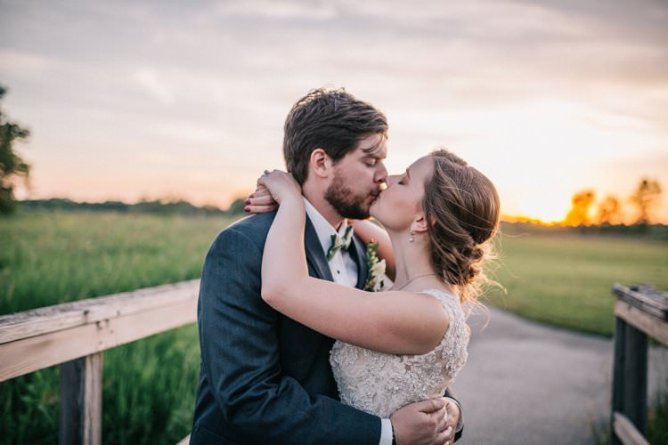 Bride Groom Bow Tie Floaty Dress Gown Blush Lace Scoop Back Buttons Sunset Updo Outdoorsy Modern Wedding in Wisconsin http://www.mcnielphotography.com/