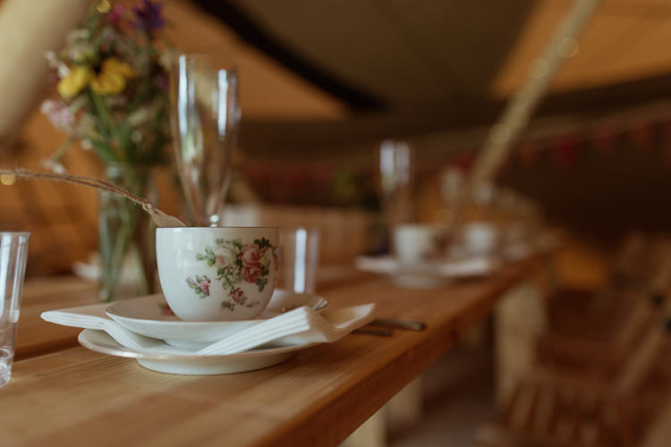 Rustic Wooden Table Vintage Crockery Tea Set Tipi Magical Woodland Clearing Colourful Tipis Wedding https://www.lukebellphotography.co.uk/