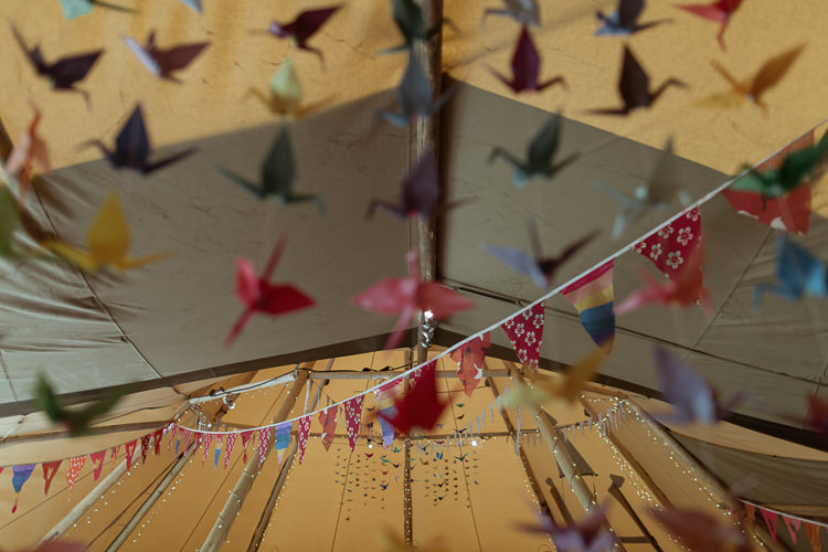 Paper Crane Bunting Multicoloured Mismatched Magical Woodland Clearing Colourful Tipis Wedding https://www.lukebellphotography.co.uk/