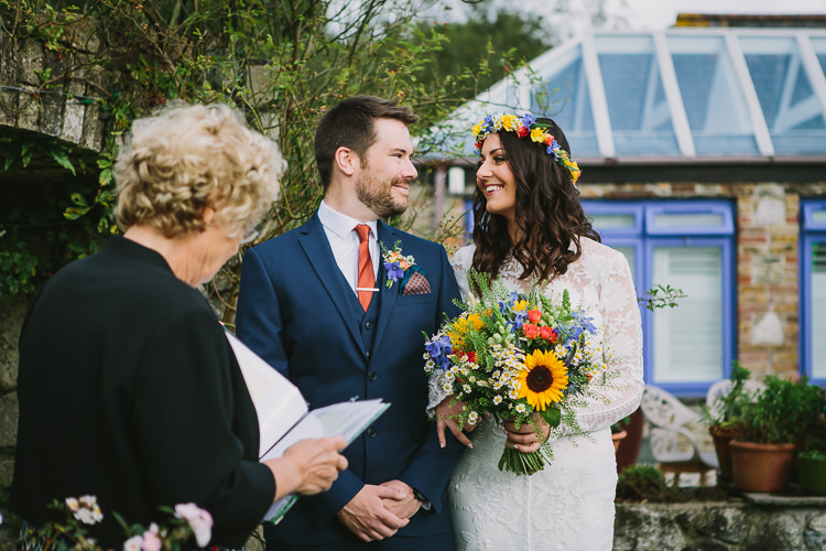Bride Bridal Rue de Seine Dress Gown Lace Sweetheart Overlay Flower Crown Multicolour Wildflower Bouquet Sunflower Navy Three Piece Waistcoat Groom Orange Tie Small Colourful Cool Alternative Wedding https://www.alexapoppeweddingphotography.com/