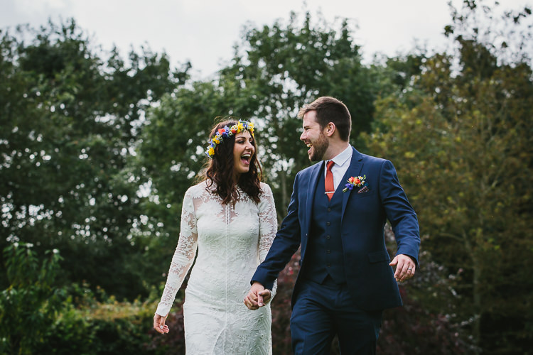 Bride Bridal Rue de Seine Dress Gown Lace Sweetheart Overlay Flower Crown Multicolour Wildflower Bouquet Sunflower Navy Three Piece Waistcoat Groom Orange Tie Small Colourful Cool Alternative Wedding https://www.alexapoppeweddingphotography.com/