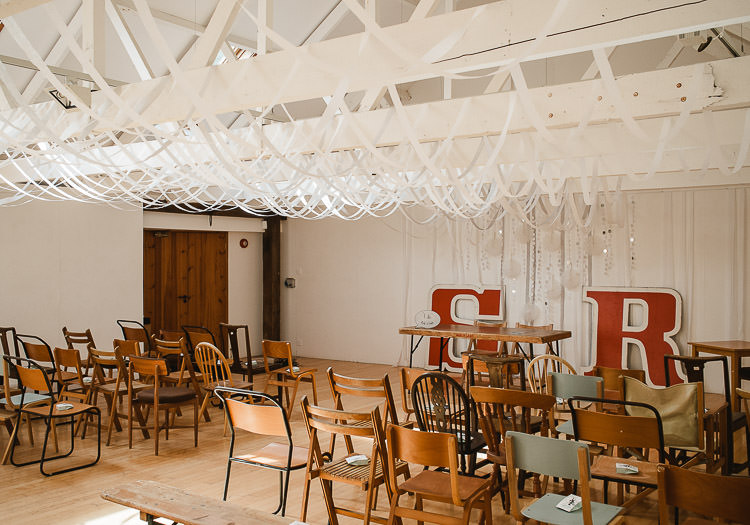 Streamers Ribbons Ceiling Hanging Ceremony Mismatched Chairs Super Cool Informal Party Wedding http://www.luisholden.com/
