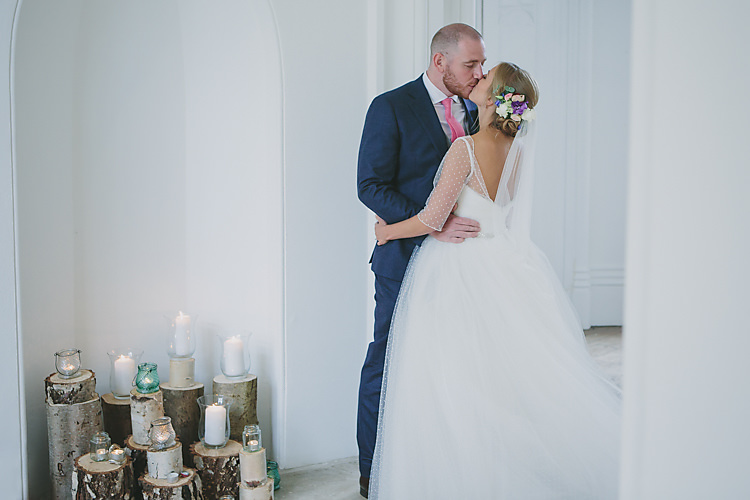 Confetti Bride Bridal Pronovias Gown Dress Sweetheart Neckline Princess Polka Dot Jacket Veil Suitsupply Groom Three Piece Waistcoat Navy Suit Grey Pink Tie Log Slice Wood Candle Pretty Country Gin Wedding http://www.victoriasomersethowphotography.co.uk/