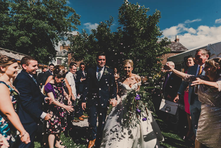 Bride Bridal Princess A Line Bardot Off the Shoulder Straps Sweetheart Neckline Ted Baker Groom Mod Suit Confetti Moment Shot Rose Gold Sequins Greenery Musical Wedding https://www.jademaguirephotography.uk/