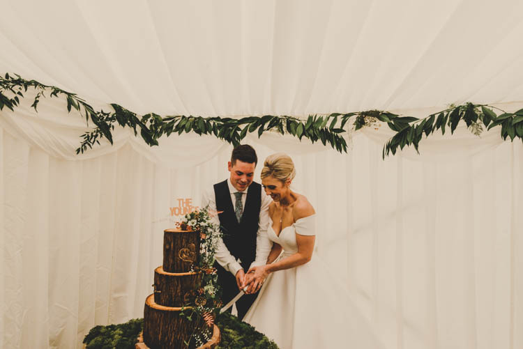 Bride Bridal Princess A Line Bardot Off the Shoulder Straps Sweetheart Neckline Ted Baker Groom Mod Suit Cake Cutting Log Wood Tiered Buttercream Moss Table Rose Gold Sequins Greenery Musical Wedding https://www.jademaguirephotography.uk/