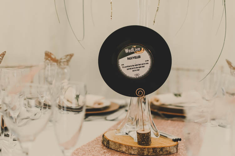 Record Table Centre Wood Slice Log Runner Rose Gold Sequins Greenery Musical Wedding https://www.jademaguirephotography.uk/
