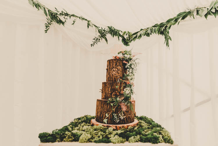Rustic Log Wood Slice Cake Moss Buttercream Rose Gold Sequins Greenery Musical Wedding https://www.jademaguirephotography.uk/