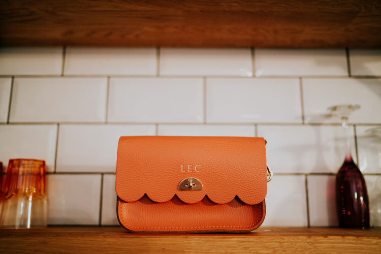 Bride Bridal Bag Cambridge Satchel Company Colourful Cool Humanist Pool Wedding http://www.stevebridgwoodphotography.co.uk/