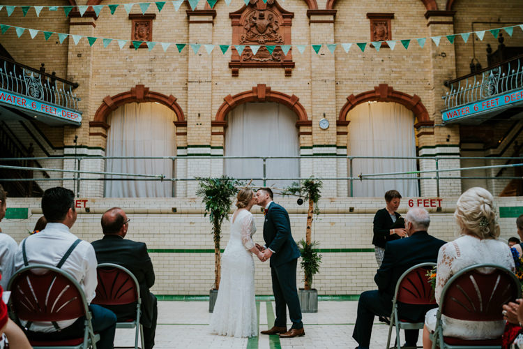 Backdrop Frame Wooden Greenery Ceremony Flower Arch Colourful Cool Humanist Pool Wedding http://www.stevebridgwoodphotography.co.uk/