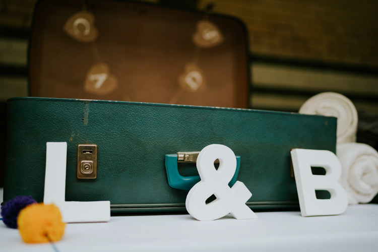 Card Suitcase Colourful Cool Humanist Pool Wedding http://www.stevebridgwoodphotography.co.uk/